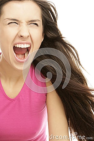 Young aggressive woman screaming loudly Stock Photo