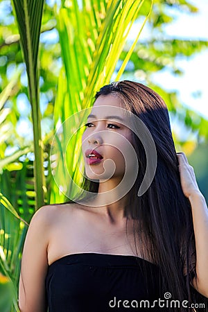 Close-up portrait of young beautiful Asian girl. Look away Stock Photo