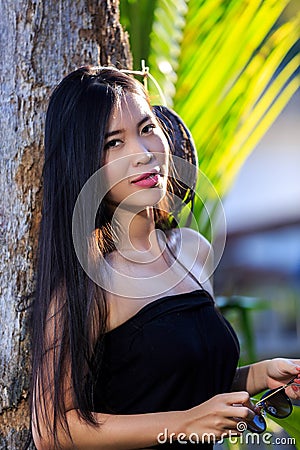 Close-up portrait of young beautiful Asian girl. Looking in the camera Stock Photo