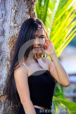 Close-up portrait of young beautiful Asian girl. Looking in the camera Stock Photo