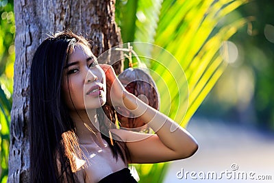 Close-up portrait of young beautiful Asian girl. Looking in the camera Stock Photo