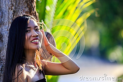 Close-up portrait of young beautiful Asian girl. Looking in the camera Stock Photo