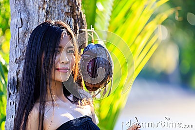 Close-up portrait of young beautiful Asian girl. Looking in the camera Stock Photo