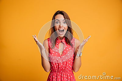 Close-up portrait of young pretty surprised woman with opened mo Stock Photo