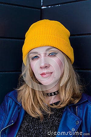 Beautiful woman in a yellow hat Stock Photo