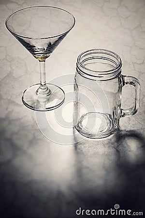 Close up pouring purified fresh drink water from the bottle on table in living room Stock Photo