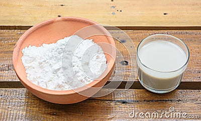 Close up powder in bowl and milk Stock Photo