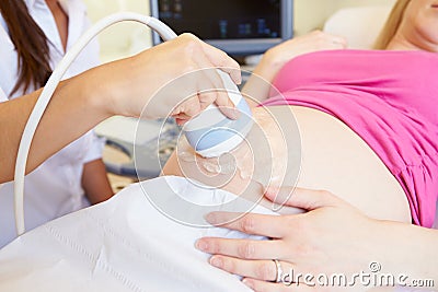 Close Up Of Pregnant Woman Having 4D Ultrasound Scan Stock Photo