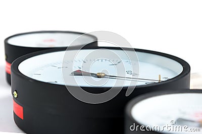 Close-up Pressure sensors in the pipeline - mono-meters. Three monometers of different sizes on a white isolated Stock Photo