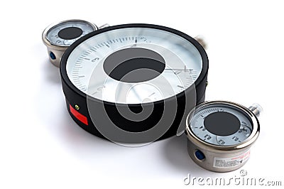 Close-up Pressure sensors in the pipeline - mono-meters. Three monometers of different sizes on a white isolated Stock Photo