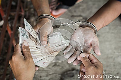 Close up prisoner give money for freedom, Stock Photo