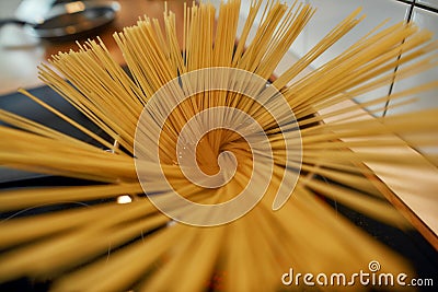 Close up of process of cooking homemade italian pasta. Home cooking concept Stock Photo