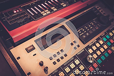 Close-up professional audio equipment with sliders and knobs at recording studio. Stock Photo