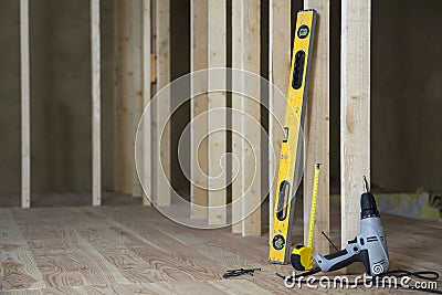 Close-up of professional tools: electrical screwdriver, level an Stock Photo