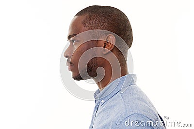 Close up profile of handsome young black man against isolated white background Stock Photo