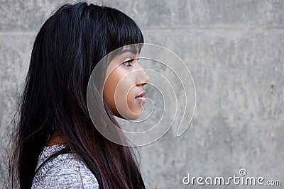 Profile portrait of beautiful young Indian woman Stock Photo