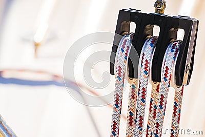 Nautical background, rigging ropes on pulley of sailing boat deck Stock Photo