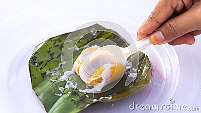 Close up of Pumpkin Koci or Kuih Koci Labu, the Malay glutinous rice flour made of pumpkin Stock Photo