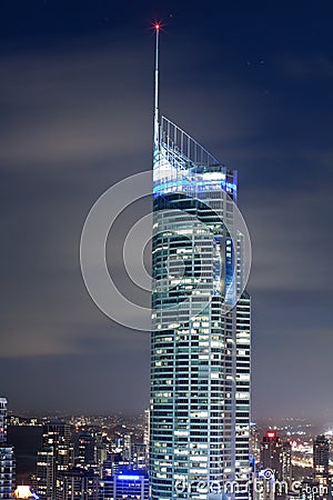 Close up of Q1 building at night Stock Photo