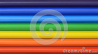 Close up of rainbow colored pastels in rows Stock Photo