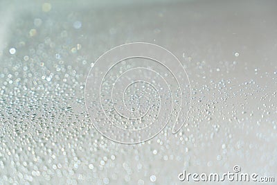 Close up of raindrops on window with sunlight. Generic background Stock Photo