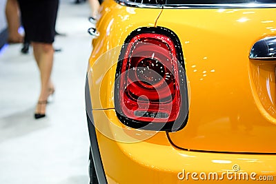 Close up rear light of yellow sports car Stock Photo