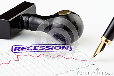 Close up of recession stamp and graph Stock Photo