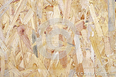 Close up of a recycled compressed light brown wood chippings board textured background. Abstract texture background Stock Photo