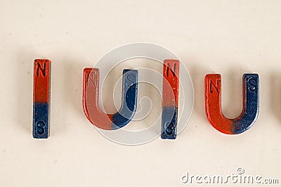 Close-up of red and blue magnet Stock Photo