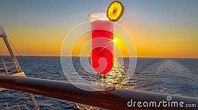Close-up of a red cocktail at sunset. Stock Photo