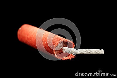 Close-up Red Firecracker on black Stock Photo