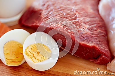 Close up of red meat fillets and boiled eggs Stock Photo