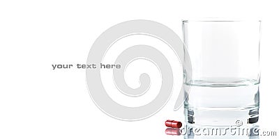 Close up of red pill and water Stock Photo