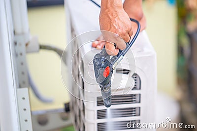 Close up of Repairman washing dirty inside compartments air conditioner, Technical clean mold in system air conditioning system Stock Photo