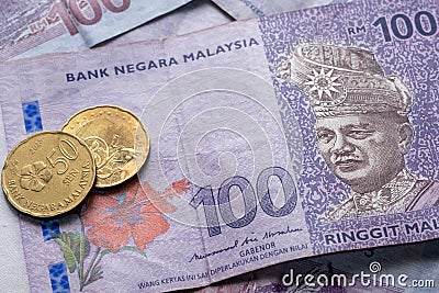 Close up of Ringgit Malaysia 100 with 50 cents, Malaysian currency Stock Photo
