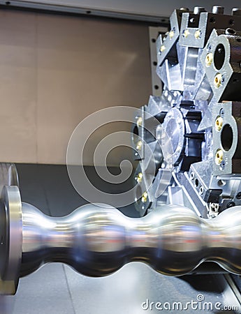 Close up rotating part CNC milling machine during metal processing Stock Photo