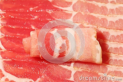 Close up of row of chunks of smoked red appetizing meat Stock Photo
