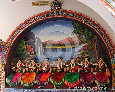 Close up of row of colourful female figurines, Hindu temple, Singapore Stock Photo