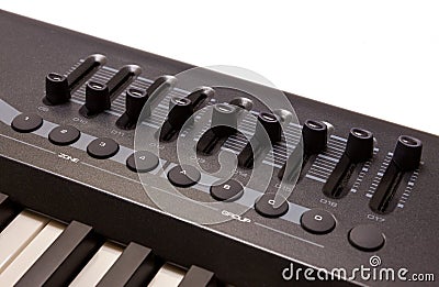 Close-up of a row of faders on a MIDI controller Stock Photo