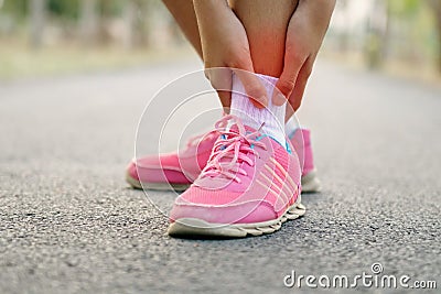 close up runer woman with leg injury Stock Photo