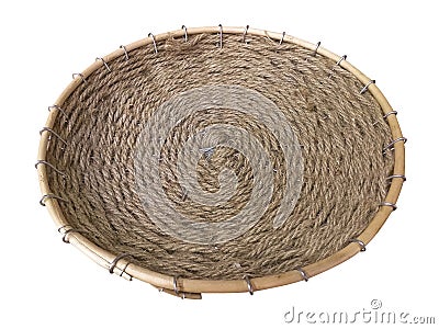 Close up of rustic raffia tray. Aerial view of natural rattan oval basket isolated on white background. Handmade bowl with natural Stock Photo