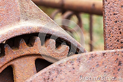 Close up of rusty gear on abandoned farm equipment Stock Photo