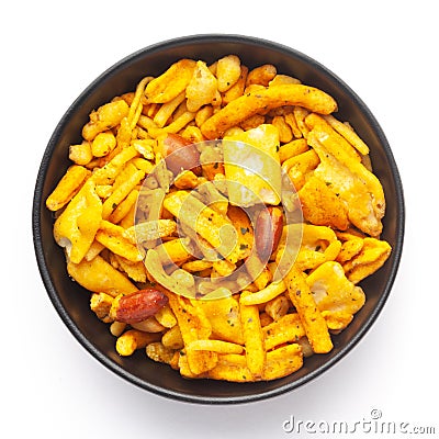 Close up of salted Gujrati Mix Indian namkeen snacks on a ceramic black bowl. Stock Photo