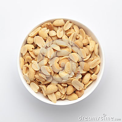 Close up of Salted Peanuts Indian namkeen snacks on a ceramic white bowl. Stock Photo