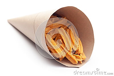 Close up of salted Soya Sticks Indian namkeen snacks In handmade handcraft brown paper cone bag Stock Photo