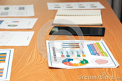 Close up sample project report together with other chart and tablet for presentaion Stock Photo