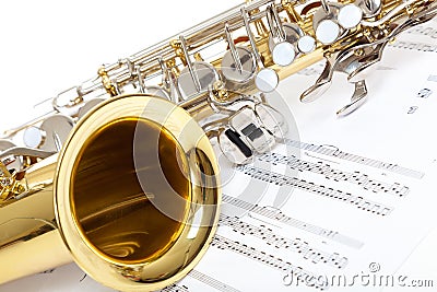 A close up of Saxophone with sheet music Stock Photo