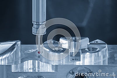 Close up scene the multi axis touching probe measuring the aluminum parts Stock Photo
