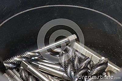 Close up scene the used machine tapping tool Stock Photo