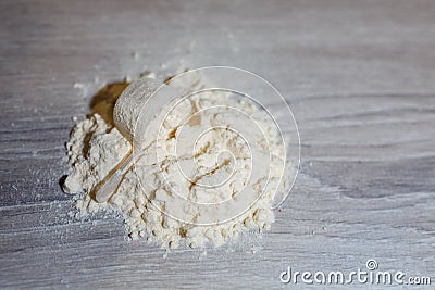 Close-up scoop in protein powder slides Stock Photo